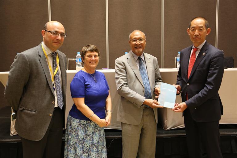 #04 Dr Kasai hands over HiT Report to Health Minister Sir Dr Temu during the launch of HiT